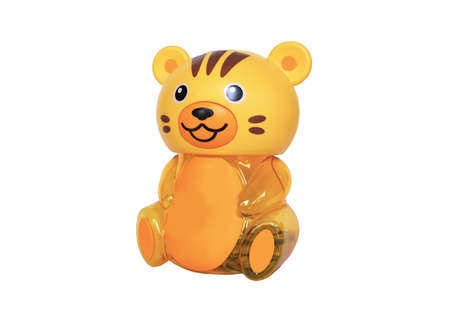 Yellow tiger : piggy bank on white backgroundの写真素材