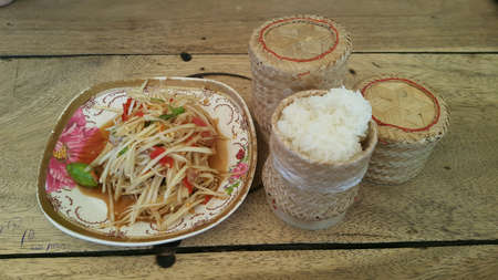 Spicy Papaya salad Som tum with sticky riceの素材