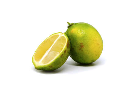 Lime. fruit with slices isolated on whiteの写真素材