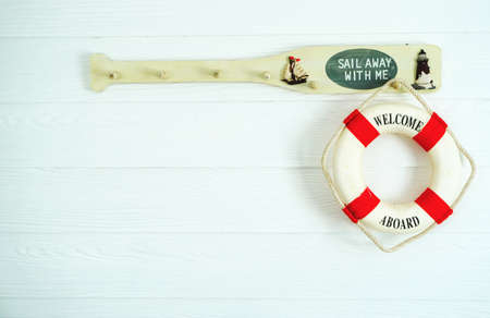 welcome Life ring hanging, wood backgroundの写真素材