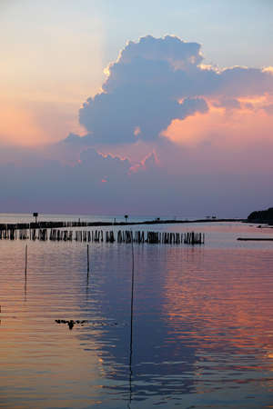 beautiful and dramatic  blue ocean in the gulf of Thailand with sunsetの写真素材