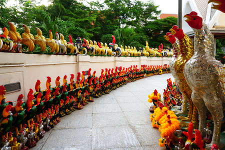 Samutsakhon ,Thailand - December 8, 2016 : Phan Thai Norasing Shrine is regarded as the symbol of honesty by the local people. Many visitors come here to worship and give offerings (chicken ,gamecock) for a better lifeのeditorial素材