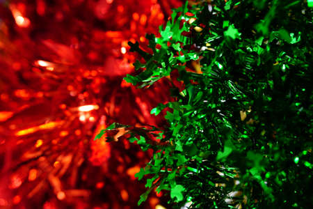 Christmas green and red tinsel, decorations backgroundの写真素材