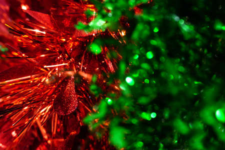 Christmas green and red tinsel, decorations backgroundの写真素材
