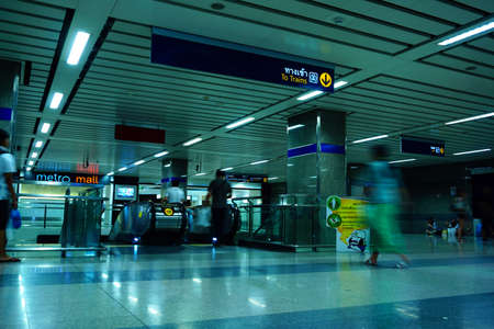 BANGKOK, THAILAND - JAN 31 2017: Unidentified travellers inside MRT entrance to underground station. The MRT serves 240,000 passengers daily with 20 km of city centre track.のeditorial素材