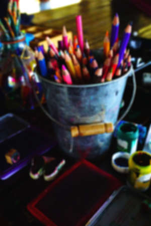 Blurred background, Color pencils and stamps. art design set on the tableの写真素材