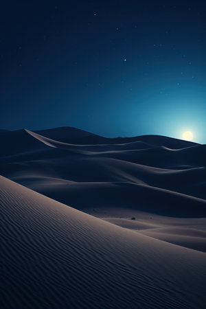 Desert sand dunes at night with full moon and stars.の素材