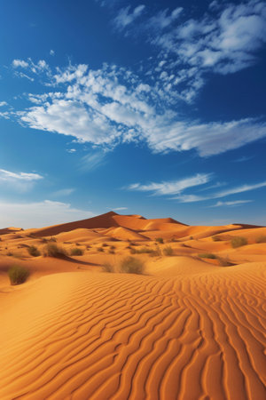 Desolate Beauty, A Vast Desert Landscape With Majestic Sand Dunes and Clear Blue Skyの素材