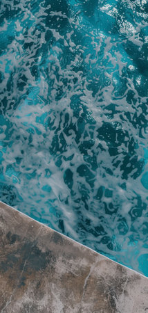swimming pool background. Top view of blue water in swimming pool.の素材