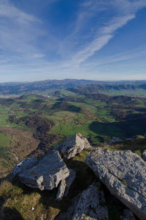green valley from the rocky top of the mount verticalの写真素材
