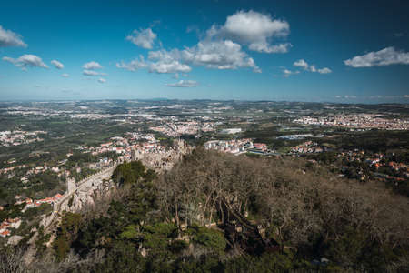 Castelo dos Mouros on mountain full of vegetation in day with clouds, horizontalの写真素材