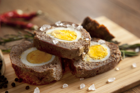 Baked meatloaf with boiled eggs for Easterの写真素材