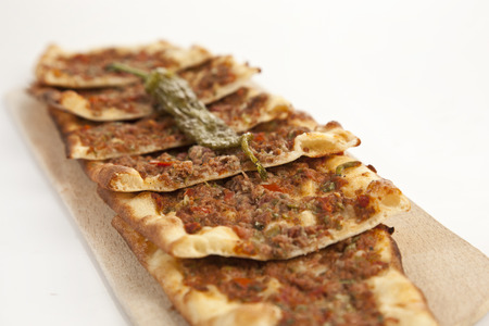 Turkish traditional beef Pide isolated with white backgroundの写真素材