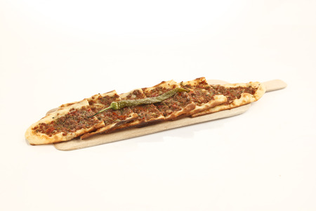 Turkish traditional beef Pide isolated with white backgroundの写真素材