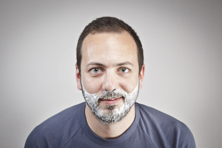 Young man shavingの写真素材