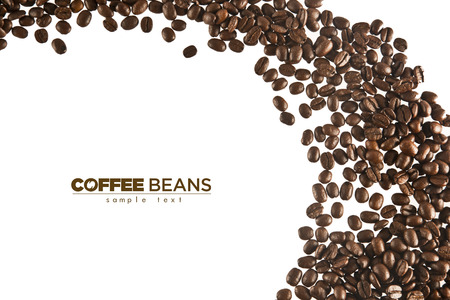 Brown coffee beans isolated on white backgroundの写真素材