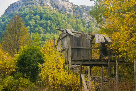 Old wooden hut, autumnの写真素材