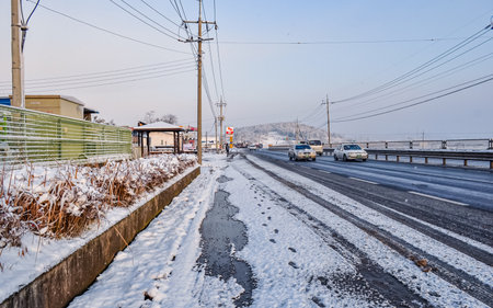 Snow covered trees in the countryside in winter. Snowy landscape at Naju, South Korea.の写真素材