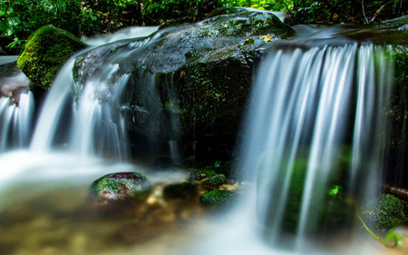 Waterfall in deep forest at Mudeungsan National Park, South Korea.の写真素材