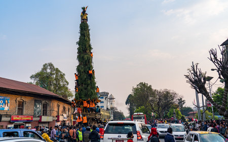 KATHMANDU, NEPAL - March 29, 2023: Devotees decorating   Chariot during Seto machindranath Chariot festival in Kathmandu.のeditorial素材