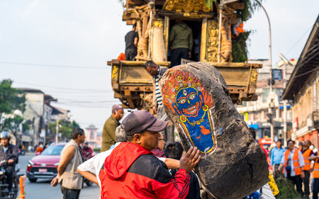 KATHMANDU, NEPAL - March 29, 2023: Devotees decorating   Chariot during Seto machindranath Chariot festival in Kathmandu.のeditorial素材