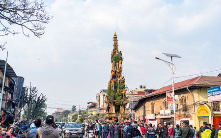 KATHMANDU, NEPAL - March 29, 2023: Devotees decorating   Chariot during Seto machindranath Chariot festival in Kathmandu.のeditorial素材