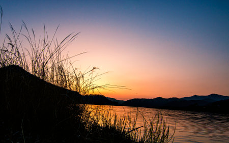 Sunset on the Mekong River in Laos, beautiful landscape.の写真素材
