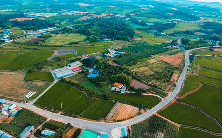 Aerial view of agricultural field and village in South Korea.