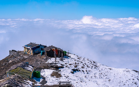 Mountain hut on the top of the mountain in the clouds. Nepalの写真素材