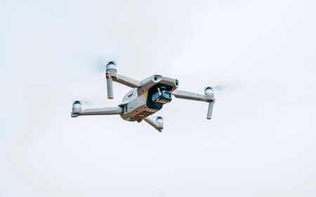 Drone flying in the sky with digital camera, close-up