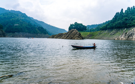 Fishing boat on the shore of the lake in Nepal, Asiaの写真素材