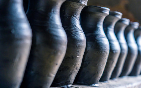 Ceramic vases in a pottery factory, closeup of photoの写真素材