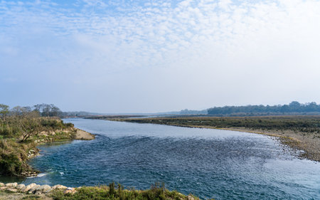Landscape view of the river with blue sky in Chitwan, Nepal.の写真素材
