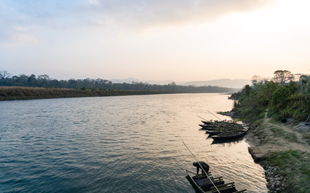Fishing boats on the Mekong River at sunset, Laos.の写真素材