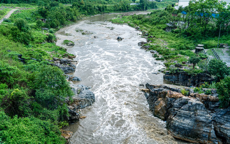 Landscape view of a Bagmati river flowing through a gorge in the jungle in Nepal.の写真素材