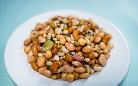Closeup view of mixed beans on plateの写真素材