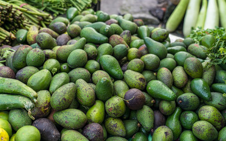 Avocado and other vegetables for sale at the local market in Nepalの写真素材