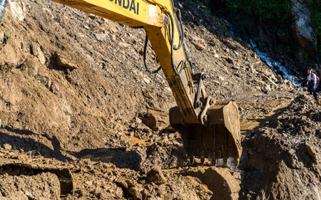 Excavator working on a construction site, close-up.