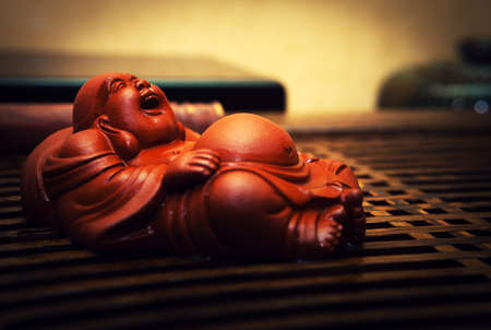 Budai the Chinese deity from mahogany Tomoyasu Hoteiの写真素材