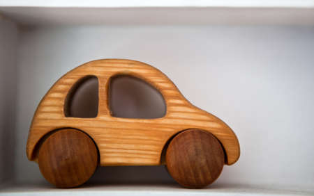 Wooden toy car white garageの写真素材
