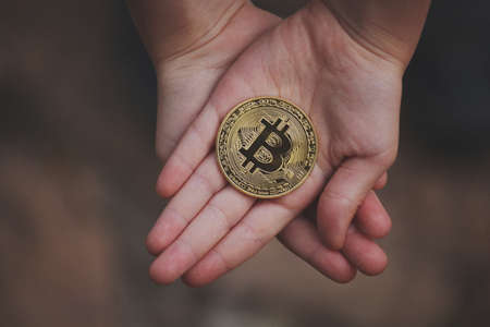 bitcoin coin children hands