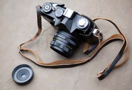Retro Camera stone background