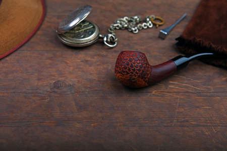 Smoking pipe hat clock wooden sharp table