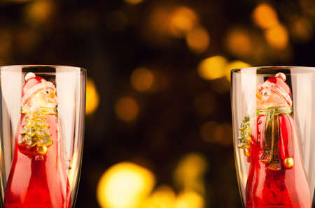 glass champagne snowman gold bokehの写真素材