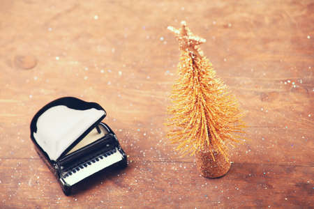 miniature fir tree black pianoの写真素材