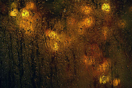 glass water drops gold bokeh