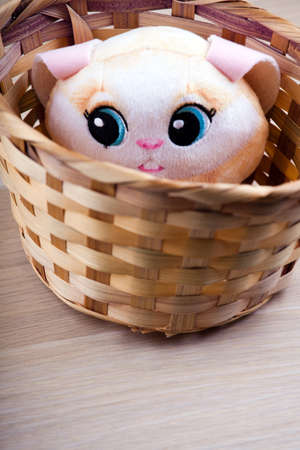 toy rabbit basket wooden table