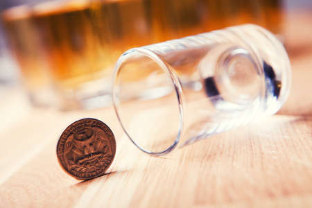 empty glass shot coin table