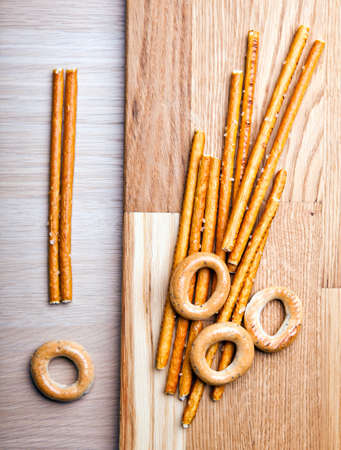 bread salt sticks wooden deskの写真素材