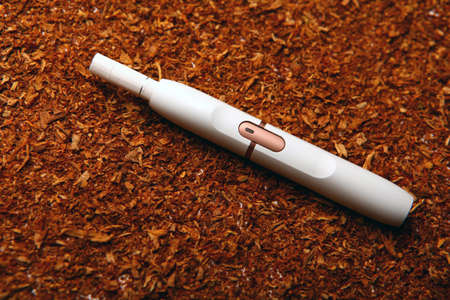 white electronic smoke device studio tobacco background
